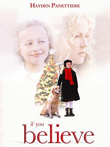 Young Hayden Panettiere (as Suzie) stands with a dog in front of a Christmas tree with images of herself and Ally Walker (as old Susan) above.