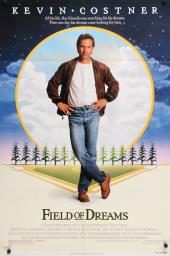 Kevin Costner (as Ray Kinsella) stands in front of his green, diamond-shaped
                corn field.