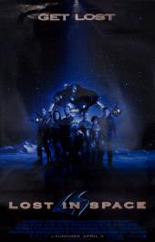 The whole crew of the Jupiter Two gather in front of Robbie the Robot on a
                planet bathed in dark blue light.