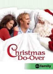 A screaming Jay Mohr (as Kevin) in bed with Daphne Zuniga (as Jill) alseep on
              one side and Michael J. Gaeta (as Santa) staring at him from the other.
