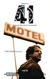 A disheveled Chris Gibson (as Aidan) stands under a motel sign and the number
                forty-one superimposed over a clock.