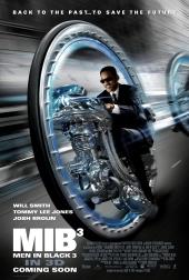 Will Smith (as Agent J) sits on a motor inside a giant wheel, zipping down a
                highway in a tunnel.
