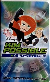 Cartoon Kim Possible and her buddy Ron Stoppable raise balled fists beside
              Rufus the naked mole=rat.