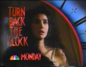 Frightened Connie Sellecca turns towards us inside the frame of a Roman clock.