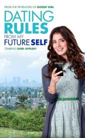 Nicely dressed Shiri Appleby (as Lucy) smiles at us over her cell phone.