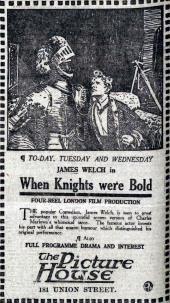 James Welch (as Sir Guy de Vere) beseeches a suit of armor in this silent film
                adverisement.