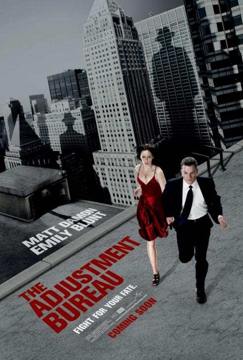 Emily Blunt (as Elise Sellas in a red evening dress) and Matt Damon (as David Norris in a black suit) race across a rooftop with shadows of a mysterious man on the background buildings.