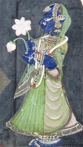 Watercolor of the Hindi princess Ravati with blue skin, a green dress, and two
              white flowers.