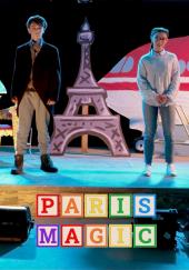 Logan Bruno and Mary Anne Spier rehearse for Paris Magic with an airplane and
              the Eiffel Tower behind them.