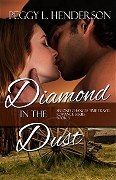 A gruff cowboy pulls a brunette woman in for a kiss over an image of a wooden cart on a dilapidated farm. On the cover of Diamond in the Dust.