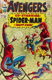 Spider-Man perches on one side of a large web that has trapped the five
                Avengers.