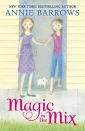 Twin twelve-year-old girls, one in a knee-length purple dress, and the other in
                jeans and a t-shirt, hold hands in a doorway beside a white kitten.