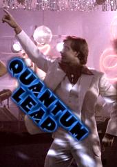 Scott Bakula (as Sam Beckett in a white suit with wide lapels) strikes a disco
                dance pose with one hand pointing high into the air.