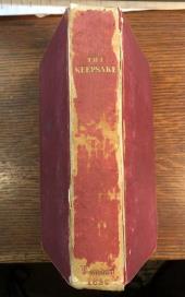 A Christmas gift book, The Keepsake, 1830, with red silk cloth binding and gold
              gilt lettering on the spine.