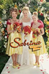 In cardinal and gold bridesmaid dresses, Beth Broderick (as Zelda) and Melissa
                Joan Hart (as Sabrina) pose beside bride Caroline Rhea (as Hilda).