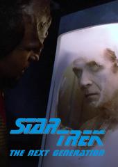 Michael Dorn (as Lieutenant Worf) examines a frozen body through the window of
                a cryogenic chamber.